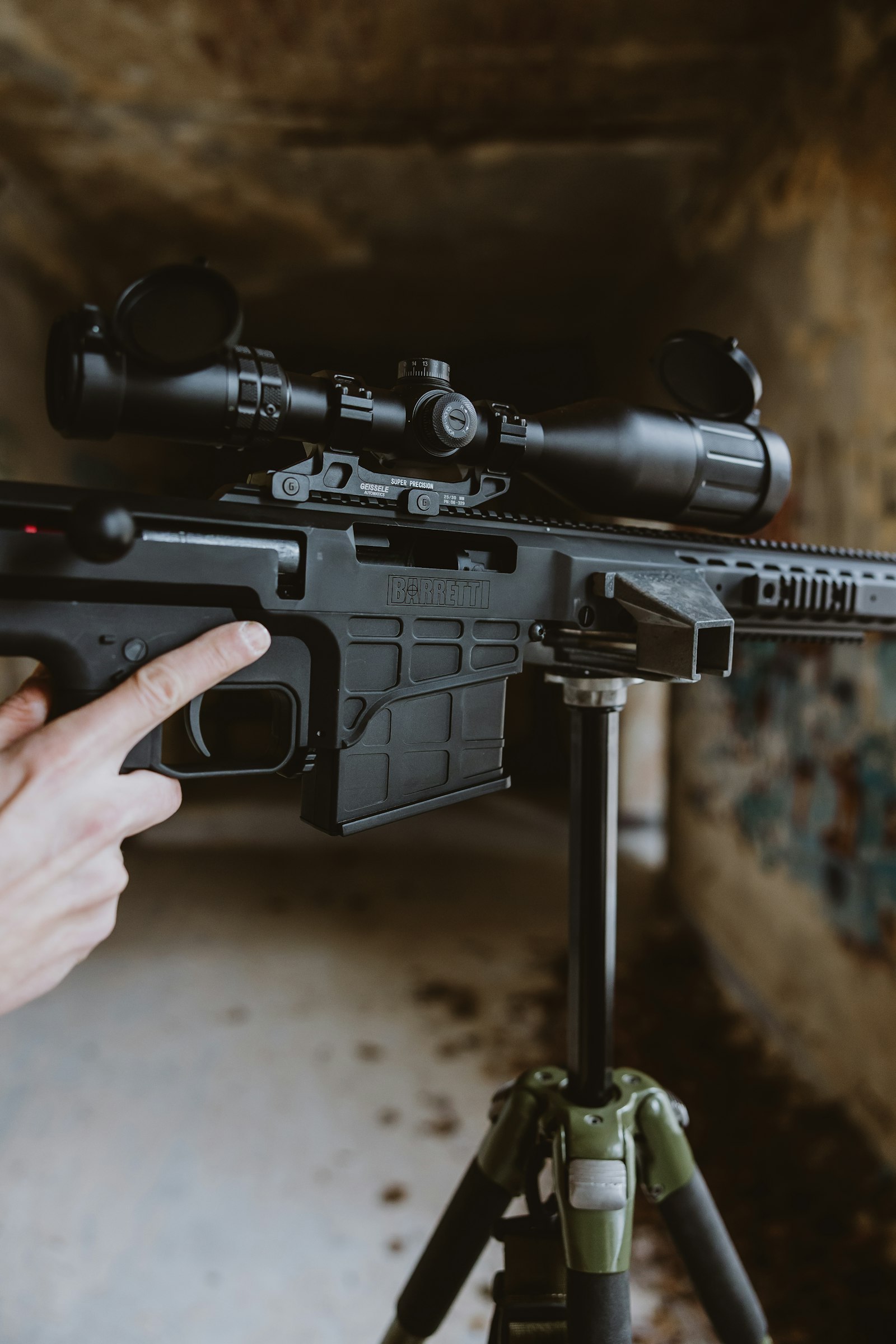 Precision rifle with scope on a tripod